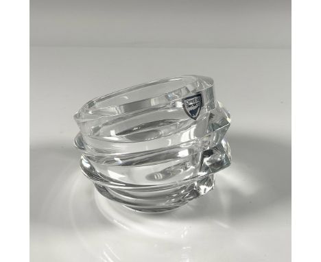 Thick clear crystal, designed in a hollow oval layered shape. Orrefors etched backstamp, and rim stamp. Includes a little can