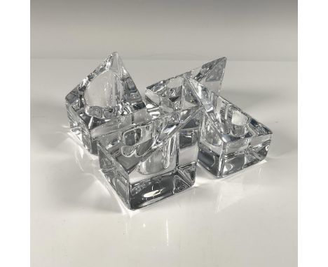 Beautiful thick clear crystal in an elegant square shape. Orrefors etched backstamp. Includes 4 pieces identical pieces. Incl