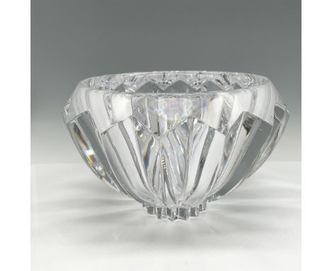 Stunning crystal with deep pleats on circumference continuing to base with smooth center bowl. Orrefors etched mark. 12lb. 13