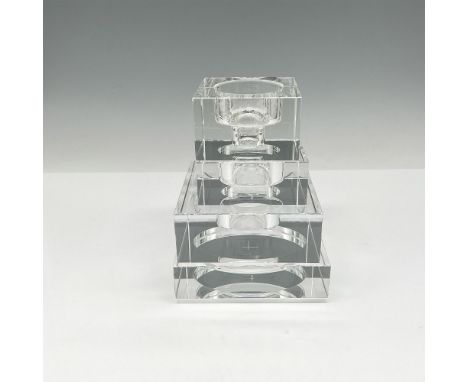 Creative design of stackable holders that can be fun to reconfigure as your whims change. Orrefors mark. This item has its or