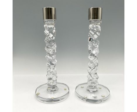 Crystal carat spire on clear round base with stainless steel holders. Orrefors mark. Issued: 21st centuryDimensions: 9.5"H x 