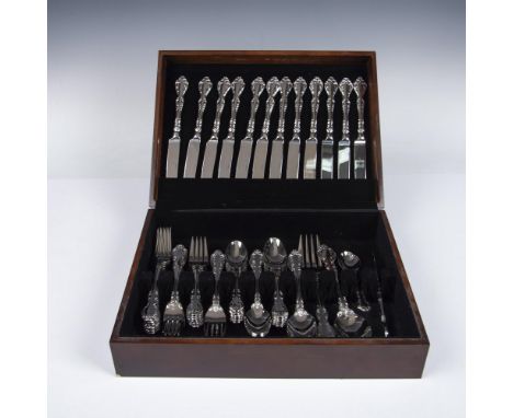 Scrolled design on head of each piece. Set includes - 12 knives 9.5", 12 forks 8", 12 salad/dessert forks 7", 12 spoons 6.5",