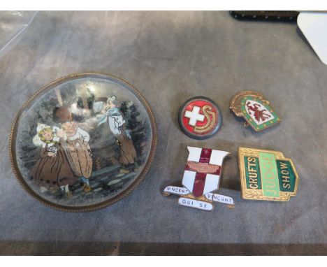 A Crufts Show Judges enamel lapel badge, another three lapel badges and an enamel bowl by Wilson &amp; Gill depicting Dutch c