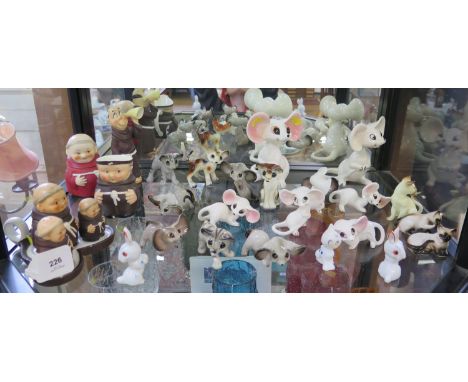 Various Goebel figures of monks, and other continental figures of mice with moving heads 