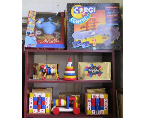 Triang 'Busy-Baby' series Round Pyramid, two Clock Banks, Cow and Locomotive in original boxes, Mattel Aladdin and Corgi cent