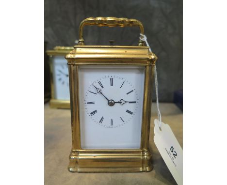 A brass carriage clock, the enamel dial inscribed Scherer Paris, the twin train repeating movement striking on a bell, 13.5 c