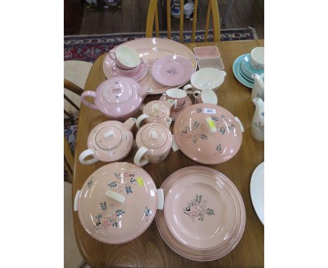 Poole Pottery dinner and tea wares in pink, including Leaping deer pattern, and others 