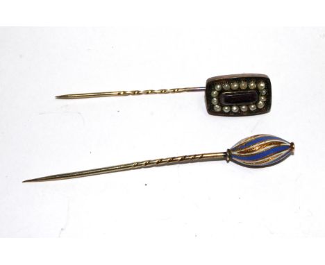 A blue and white enamel stick pin together with a seed pearl pin 