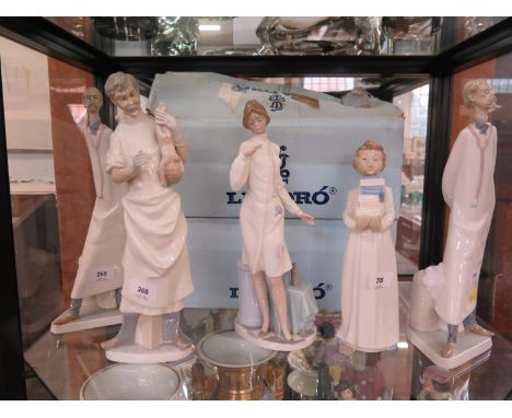 Two Lladro figures of a doctor, 36 cm high, another of an obstetrician, 36 cm high (with box), another of a doctor (lacks the