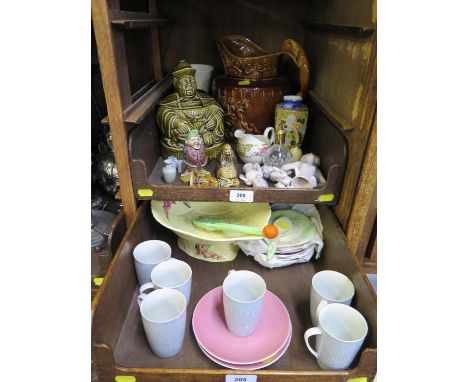 A Carlton Ware yellow leaf design pedestal dish and a salad spoon, a set of six Cmielow blue and pink coffee cups and saucers