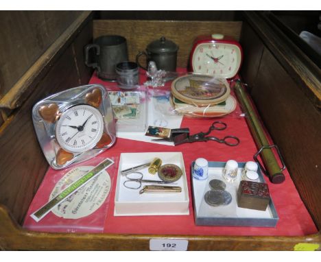 An Arts and Crafts style clock 11cm, retro 1950s clock, European beer mats, 'D' printing block, snuffer scissors, Salter scal