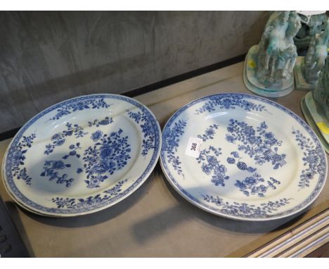 A set of four Chinese blue and white porcelain plates, with floral decoration, unmarked possibly Kangxi, 23 cm diameter