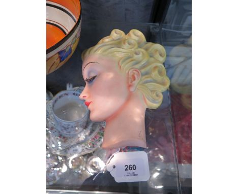 A Goebel profile mask of a lady, 'specially designed by Miss Agnes Richardson' impressed mark, 22 cm high 