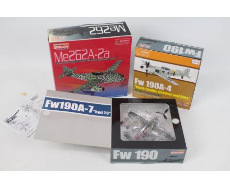 Dragon - Three boxed diecast 1:72 scale model aircraft from Dragon's Warbird Series. Lot consists of #50324 FW190A-4 'Black D