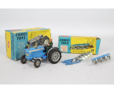 Corgi Toys - A boxed Corgi #67 Ford 5000 Super Major Tractor with blue body, grey hubs and mudguards with silver trim, driver