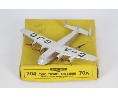 Dinky Toys - A boxed Dinky Toys #70A Avro York Air Liner. The model in silver with four red three bladed propellers with the 