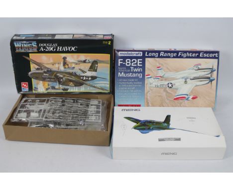 Meng - AMT - Modelcraft - Three boxed military aircraft plastic model kits in various scales. Lot consists of Meng 1:32 scale