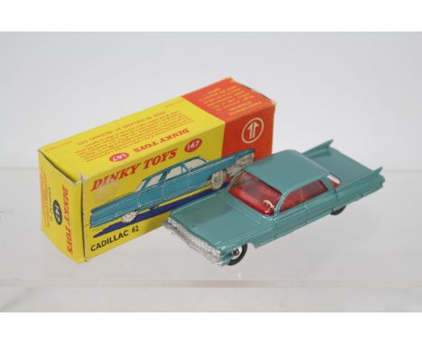 Dinky - A boxed Dinky Cadillac 62 Series Sedan # 147. The car appears in Mint condition in a Good early style box with some l