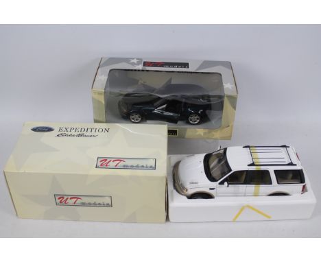 UT Models - 2 x boxed 1:18 scale cars, a BMW Z3 Coupe 2.8 and a Ford Expedition Eddie Baur Edition. The BMW has a detached mi