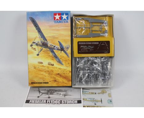 Tamiya - A boxed Tamiya #61100 1:48 scale 'Aircraft Series Fiesler Fi156C Storch Milestone 100th release plastic model kit. T