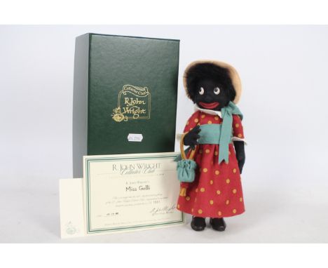 R. John Wright Collectors Club, black felt doll entitled "Miss Golli" - A first exclusive offering of the R. John Wright Coll