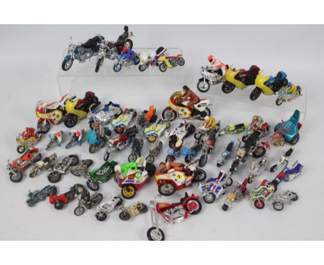 Tonka - DC Comics - Mattel - Matchbox. In excess of 40 loose, die cast and plastic model motorcycles to include: A Vintage To