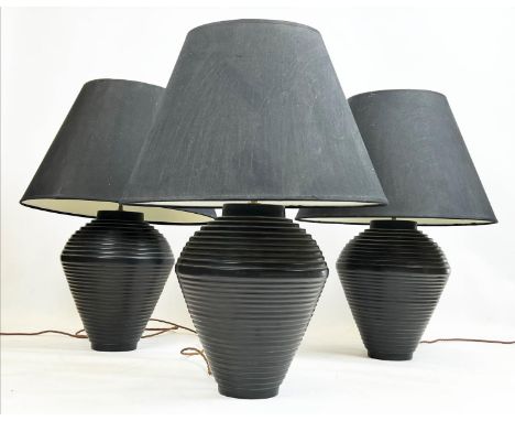 TABLE LAMPS, a set of three, black ceramic ribbed design with shades, 75cm H. (3) 