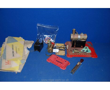 A quantity of Mamod steam engine parts.