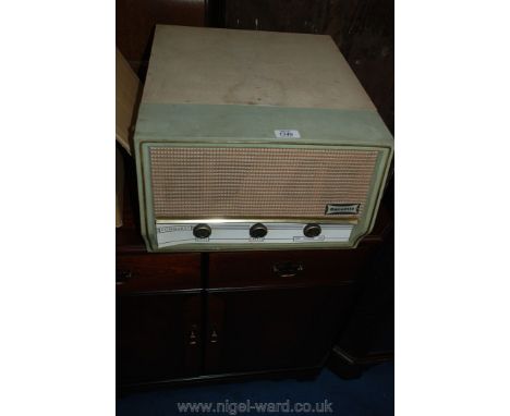 A ''Dansette Conquest Auto'' record Player, (15/3/45/78 rpm) having cream and pale green case.