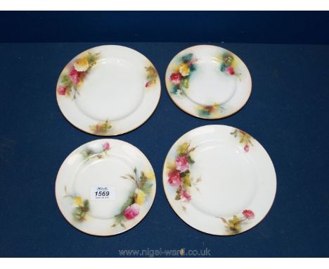 Two Royal Worcester plates and 2 saucers with hand painted saucers.