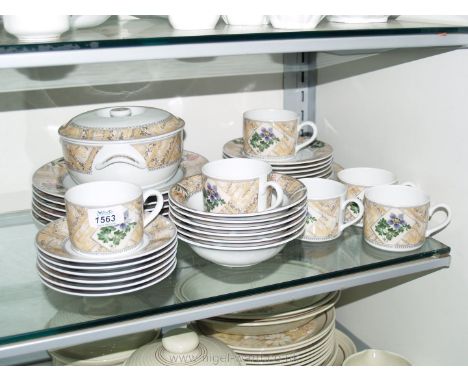 A quantity of Royal Worcester 'Country Garden' pattern dinner/tea service including; dinner plates, cups, saucers, plates, sw