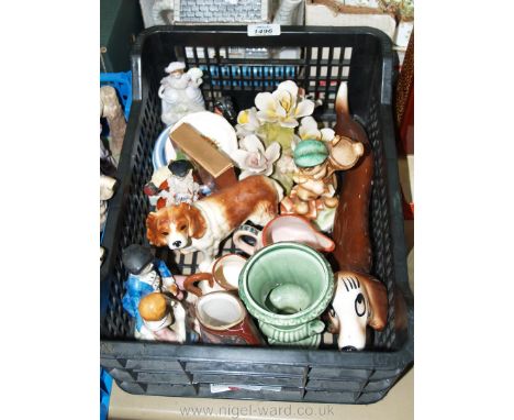 A quantity of small china including Dachshund, Goebel style figure, Dartmouth vase, pin dishes, black Scottie dog, posy, etc.