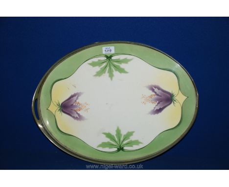 A galleried tray with Art Nouveau ceramic base.