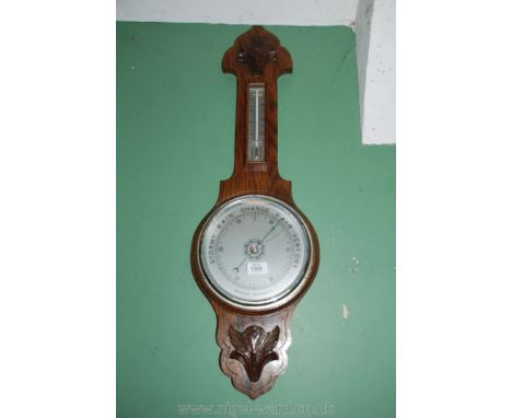 An Oak cased aneroid Barometer and thermometer, 32'' long overall