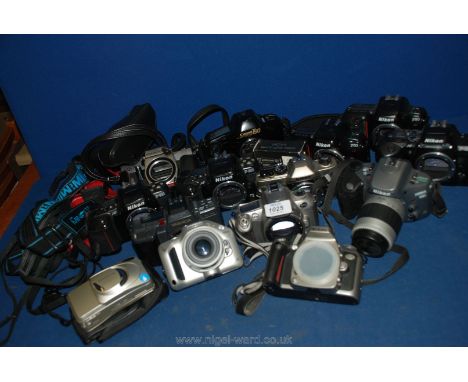 A large quantity of SLR film Cameras to include; Minolta, Nikon, Canon, etc.