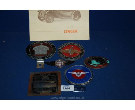A quantity of car badges including; a Rolls Royce owners club, plaque and enamel badge, a 1930's Standard Union Jack Winged e