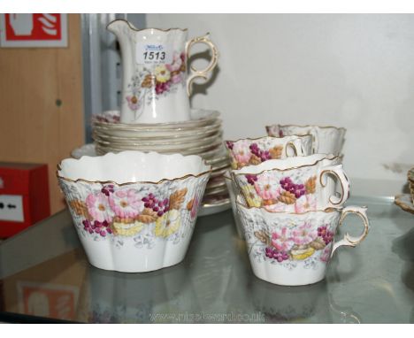 A dainty floral Victorian part Teaset comprising bread and butter plate, five tea plates, six cups and saucers, sugar bowl an