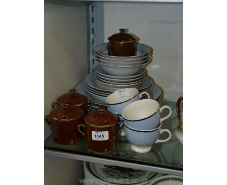 A blue and gold rimmed Doulton dinner/tea service to include; dinner plates, cups, saucers, pudding bowls and four Worcester 