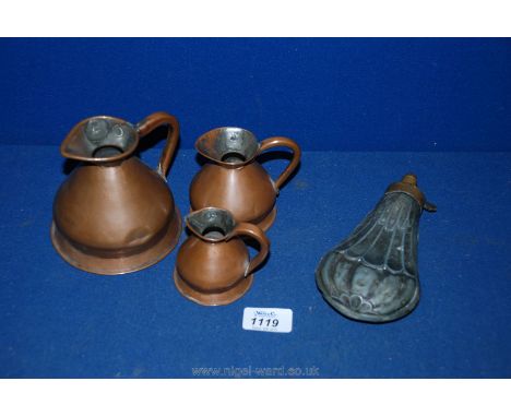 A USA civil war Powder Flask and three copper Measuring Jugs