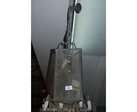 A triangular shaped Brass framed and glazed Hall Lantern, 18 1/2'' tall x 6 3/8''