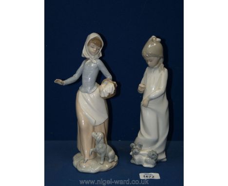 Two Nao figures; one of a young girl with a dog at her feet and the other of a lady with a basket and a dog.
