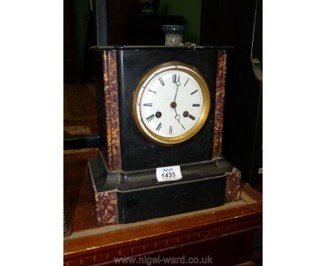 A black marble Mantle Clock