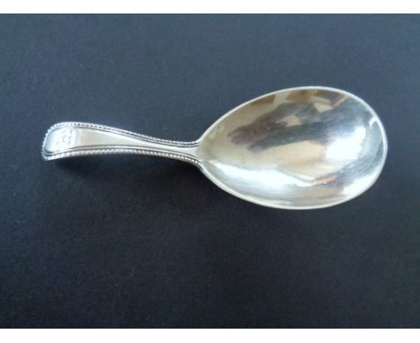 A silver caddy spoon 1864