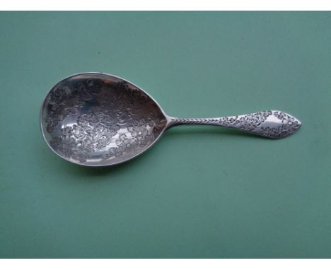 A very fine engraved caddy spoon 1891
