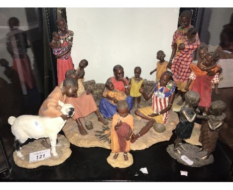 FULL SHELF OF AFRICAN ORNIMENTS