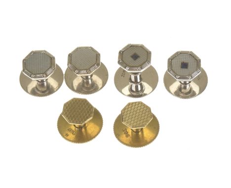 A set of gentleman's gem-set studsModelled in white metal, of octangonal form with mother of pearl panels, two set with blue 