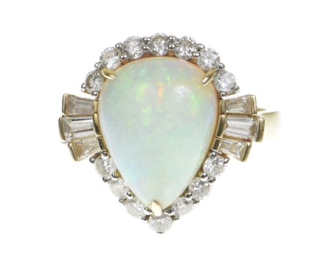 An opal and diamond cluster ringThe pear shape cabochon opal within a graduated round brilliant-cut diamond surround, with ba