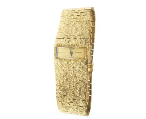 Bueche-Girod: A 1970's ladies manual wind bracelet watchThe rectangular signed gilt dial, with twelve and six black Roman num