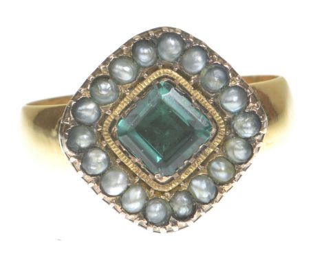 A late 19th century green paste and seed pearl cluster ringCentering a lozenge shape step-cut paste to a seed pearl surround,