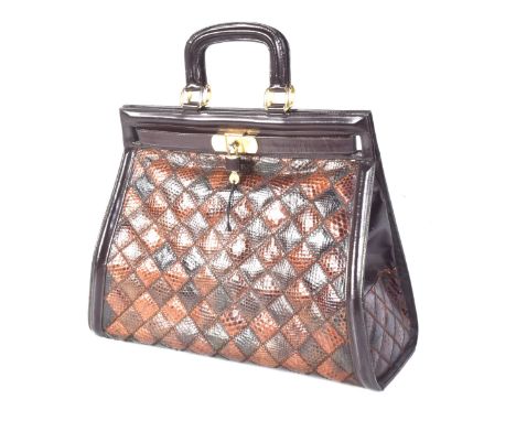 A 1970's snake skin and leather birkin style bagOf tapered form, with brown leather and snake skin patch work, two handles, t